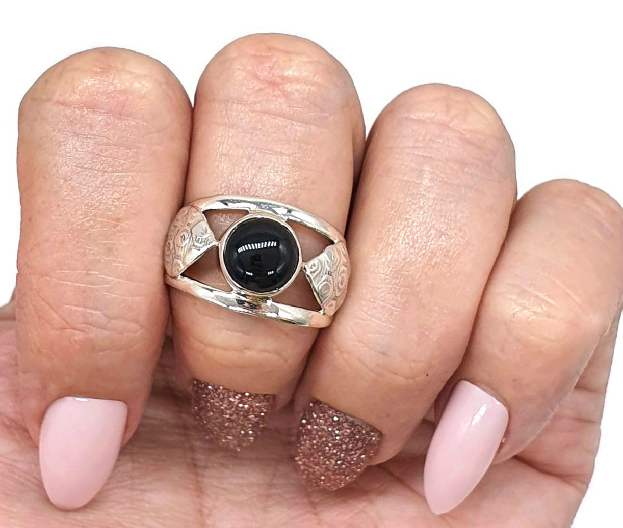 Black onyx store ring which finger